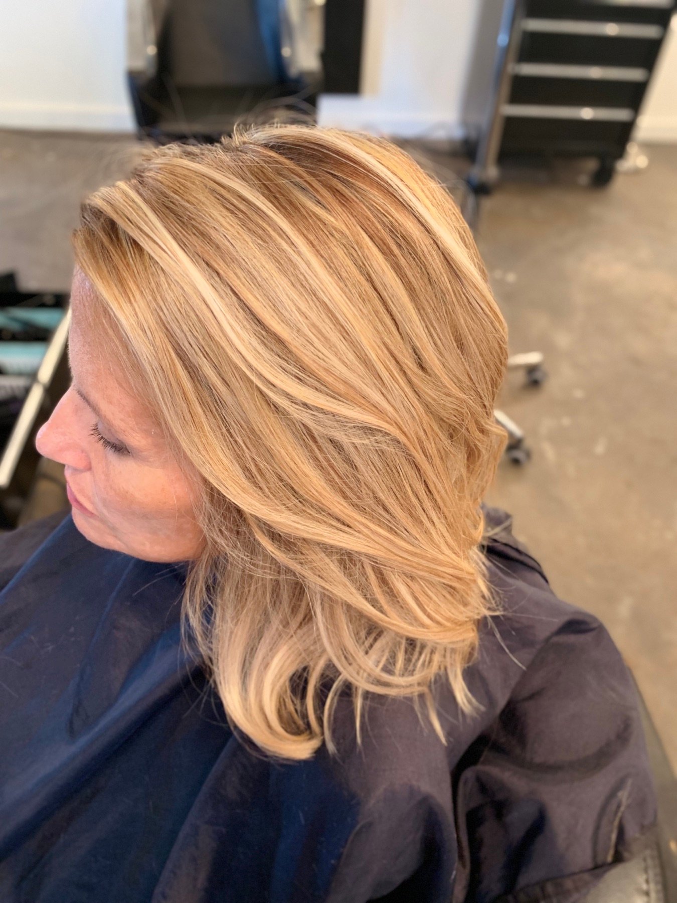 Bright blonde highlights created by Aimee