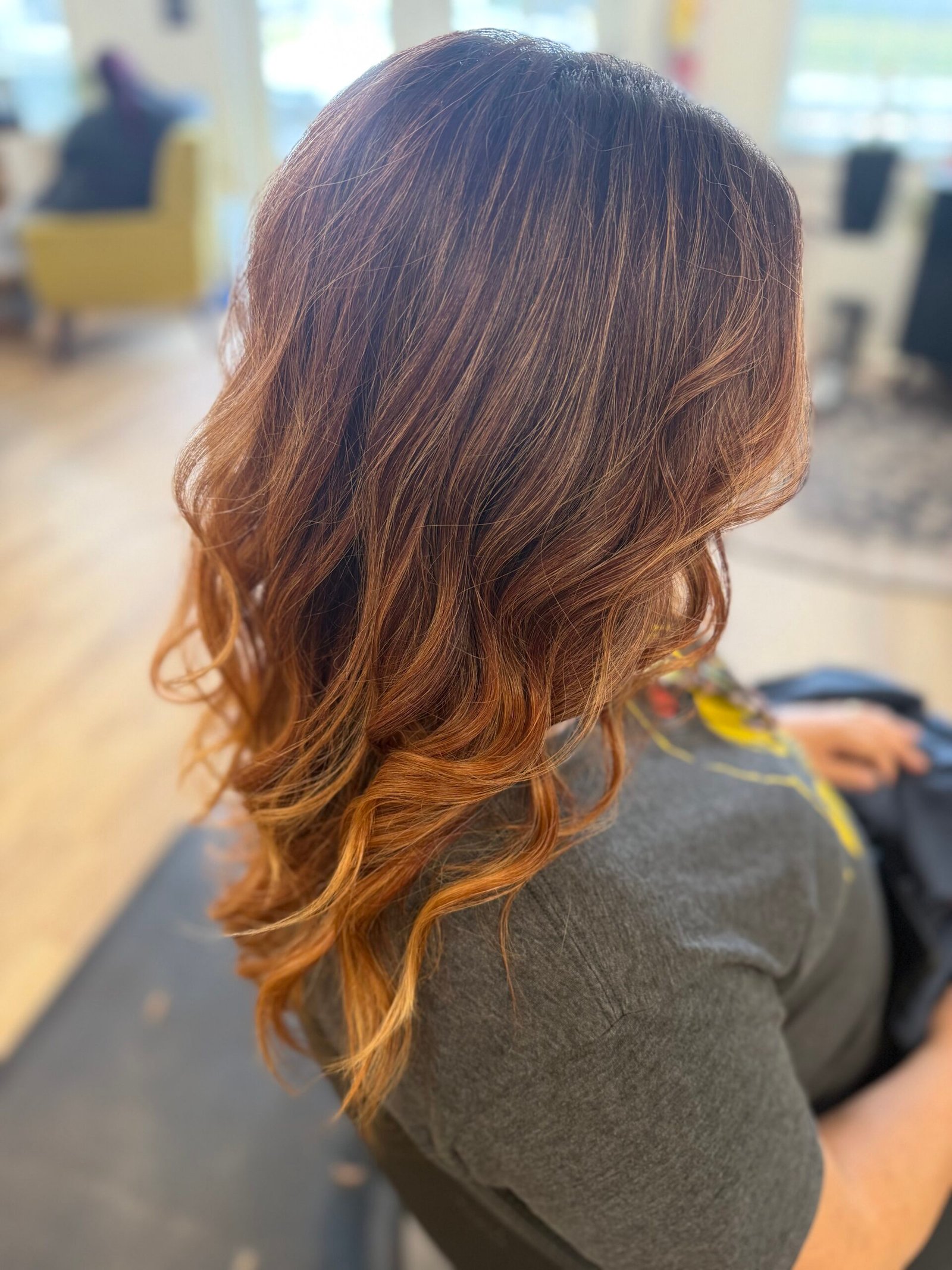 Brunette color with caramel dimension created by Aimee